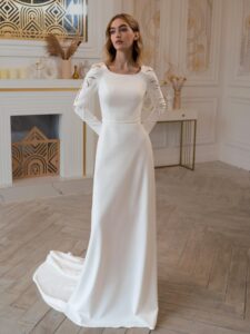 Plain wedding dress with long sleeves and open back