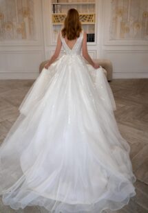 Style #2414L, V-neck A-line wedding dress with a slit; available in ivory