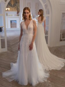 V-neck wedding dress with beads, feathers, and open back