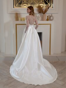 Mikado A-line wedding dress with long beaded sleeves and bow decor