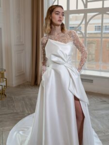 Mikado A-line wedding dress with long beaded sleeves and bow decor