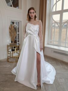 Mikado A-line wedding dress with long beaded sleeves and bow decor