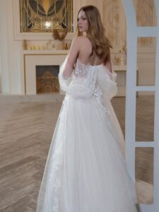 A-line wedding dress with off-the-shoulder straps and floral embroidery; available in ivory-pink