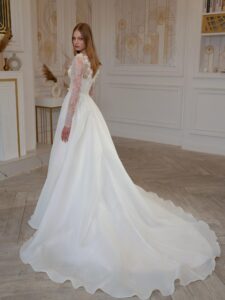 Organza A-line wedding dress with lace bustier style corset and long sleeves