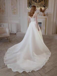 Organza A-line wedding dress with lace bustier style corset and long sleeves