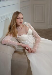Style #2422L, organza A-line wedding dress with lace bustier style corset and long sleeves; available in ivory