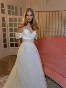 Polka-dot tulle ball gown with off-the-shoulder sleeves and floral embroidery