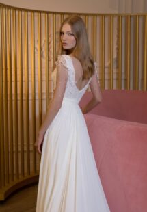 Style #2424L, V-neck chiffon sheath wedding gown with 3D flowers and beaded strings; available in ivory