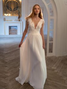 V-neck chiffon sheath wedding gown with 3D flowers and beaded strings
