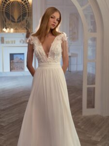 V-neck chiffon sheath wedding gown with 3D flowers and beaded strings