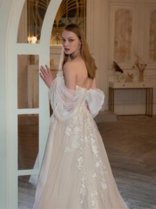 High-low A-line wedding dress with off-the-shoulder straps and 3D floral decor