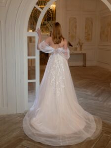 High-low A-line wedding dress with off-the-shoulder straps and 3D floral decor