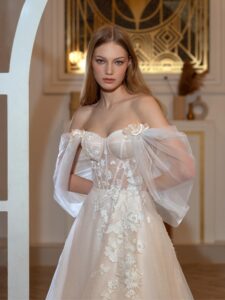 High-low A-line wedding dress with off-the-shoulder straps and 3D floral decor