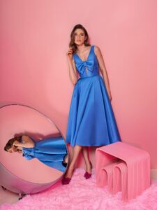 Style #806, Mikado A-line cocktail dress with a bow; available in midi or floor length; in dark blue (shown online), grey-blue, azalea, ivory