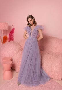 Style #810, A-line evening dress with ruffled plunging neckline and open V-back; available in purple (shown online), ivory, grey-blue, black, cherry, powder, pink