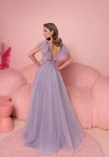 Style #810, A-line evening dress with ruffled plunging neckline and open V-back; available in purple (shown online), ivory, grey-blue, black, cherry, powder, pink