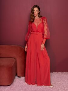 Style #812-8, long-sleeved jumpsuit with palazzo pants; available in cherry (shown online), grey-blue, purple, powder, black, ivory