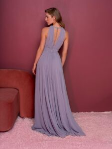 Style #814, halter neck evening gown with a high slit; available in smoky (shown online), ivory, watermelon, light green, peach, scarlet, cherry, pink, berry, cornflower blue, white, mint, powder, purple, black, yellow, sea green, grey-blue, sky-blue, azure