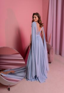 Style #828, chiffon sheath evening gown with cape sleeves and low back; available in grey-blue (shown online), green, purple, light green, watermelon, pink, powder, cherry, azure, black, ivory