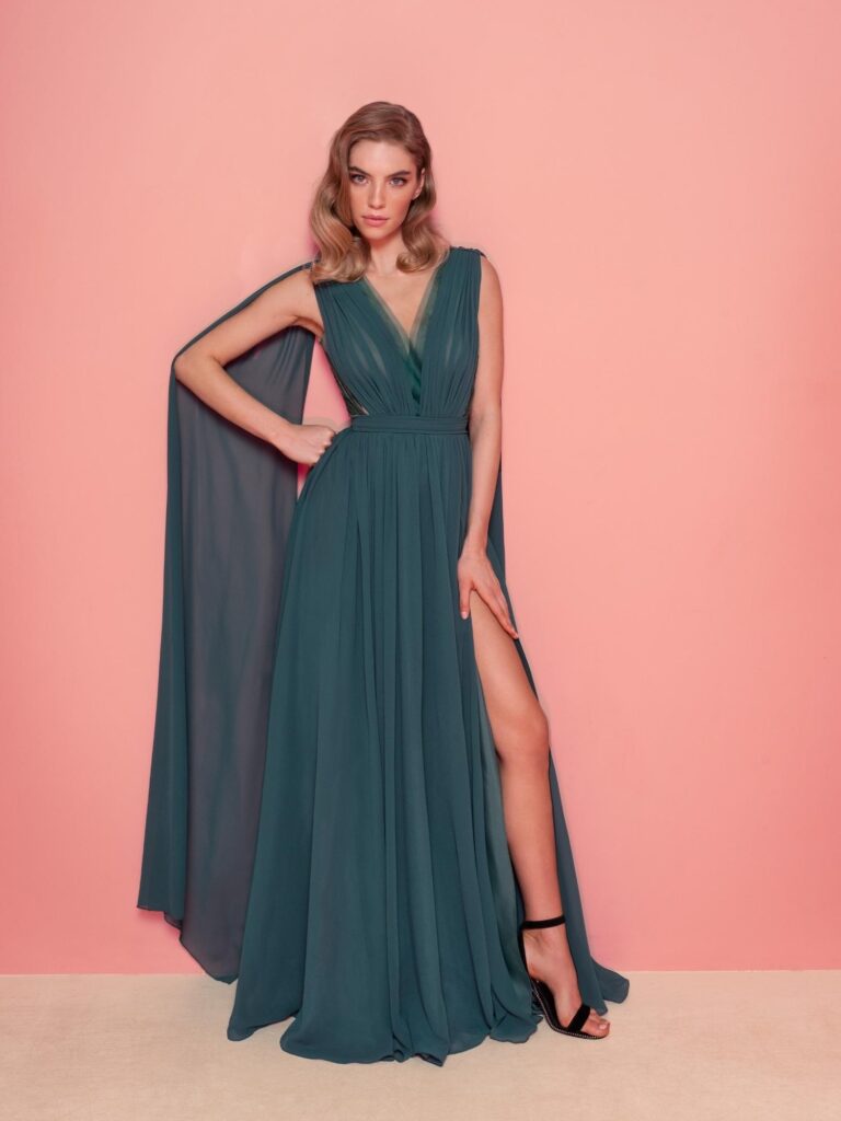 Style #828, chiffon sheath evening gown with cape sleeves and low back; available in grey-blue, green (shown online), purple, light green, watermelon, pink, powder, cherry, azure, black, ivory