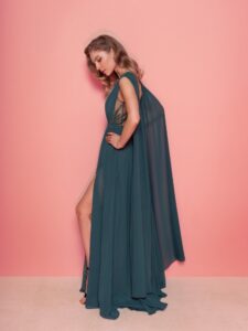 Style #828, chiffon sheath evening gown with cape sleeves and low back; available in grey-blue, green (shown online), purple, light green, watermelon, pink, powder, cherry, azure, black, ivory