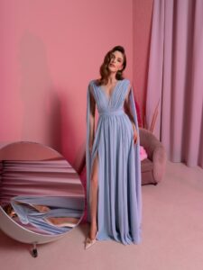 Style #828, chiffon sheath evening gown with cape sleeves and low back; available in grey-blue (shown online), green, purple, light green, watermelon, pink, powder, cherry, azure, black, ivory
