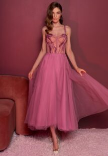 Style #829, tea-length A-line gown with a bustier style bodice and thin straps; available in pink (shown online), light green, ivory, purple, powder, cherry, grey-blue, azure, black, watermelon