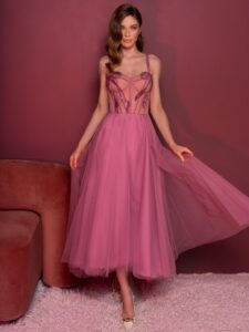 Style #829, tea-length A-line gown with a bustier style bodice and thin straps; available in pink (shown online), light green, ivory, purple, powder, cherry, grey-blue, azure, black, watermelon