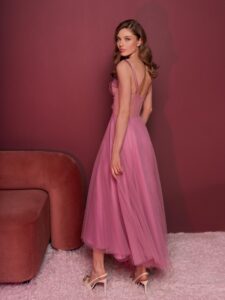 Style #829, tea-length A-line gown with a bustier style bodice and thin straps; available in pink (shown online), light green, ivory, purple, powder, cherry, grey-blue, azure, black, watermelon