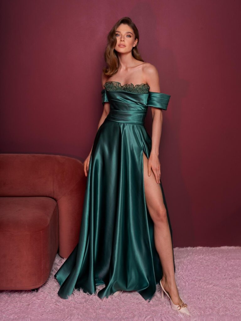 Style #833, off-the-shoulder satin gown with floral embroidery and a slit; available in green, black, blue