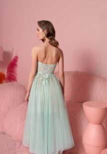 Style #834, tea-length A-line dress with bustier style bodice and spaghetti straps; available in light green