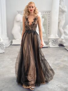 A bold statement from the Galatea Collection! This black and nude dress formal features sheer tulle layers with intricate embroidery, creating an unforgettable look for your next event.