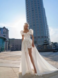 Short lace wedding dress with detachable organza skirt; available in ivory-powder, ivory