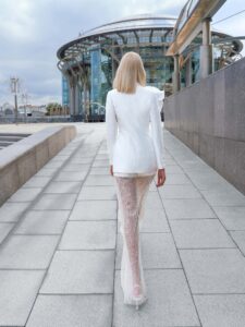 Three-piece bridal set with beaded sheer lace pants and a detachable floral brooch