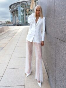 Three-piece bridal set with beaded sheer lace pants and a detachable floral brooch