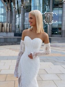Lace fit & flare wedding gown with fringe