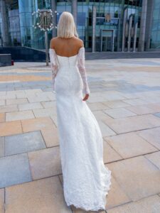 Lace fit & flare wedding gown with fringe
