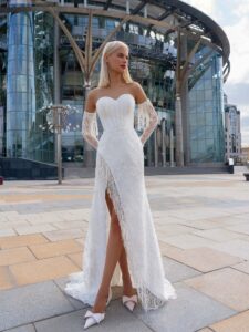 Lace fit & flare wedding gown with fringe