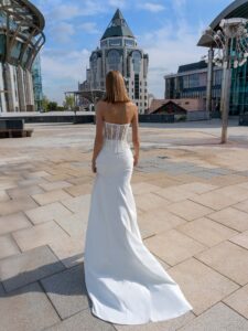 Three-piece bridal ensemble with off-the-shoulder cape