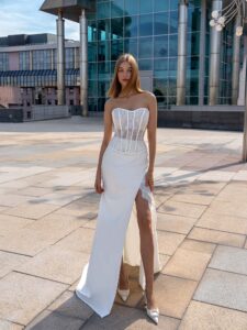 Three-piece bridal ensemble with off-the-shoulder cape