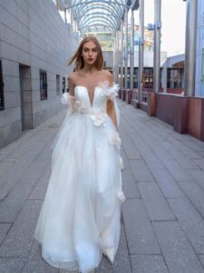 Blossom tulle wedding gown with detachable cape sleeves