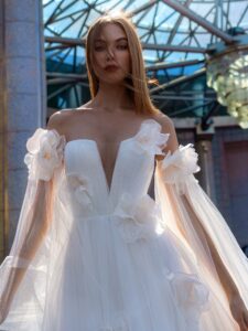 Blossom tulle wedding gown with detachable cape sleeves