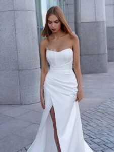 Satin wrap-style wedding gown with detachable cape