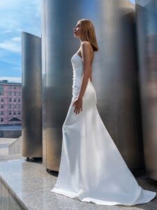Satin wrap-style wedding gown with detachable cape