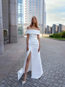 Satin wrap-style wedding gown with detachable cape