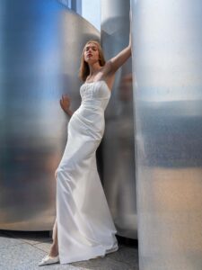 Satin wrap-style wedding gown with detachable cape