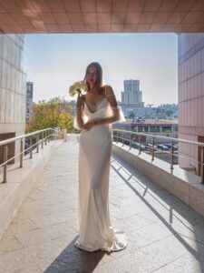 Cowl neckline wedding gown with detachable sleeves