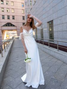 Cowl neckline wedding gown with detachable sleeves