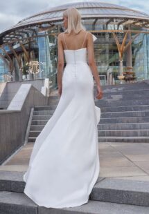 Style #16026, chic wedding dress with dramatic flares; available in ivory