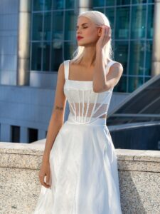 Modern midi bridal skirt with structured corset